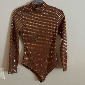 Brown long sleeve metallic bodysuit. NWOT. Boutique brand. True to size.